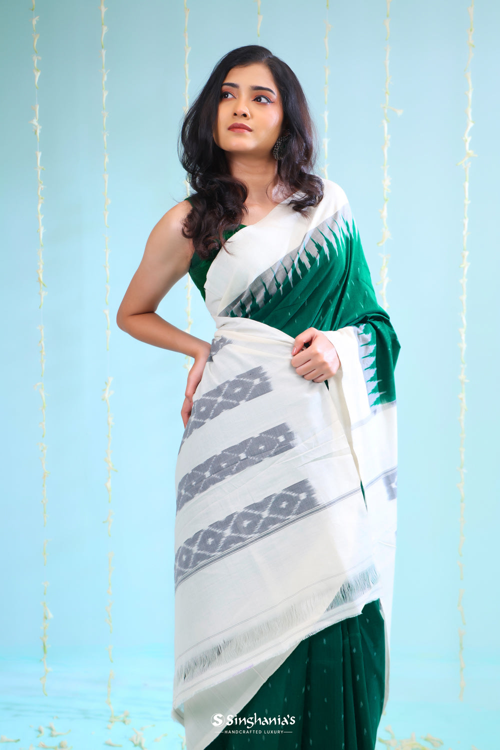 Bottle Green Ikkat Cotton Saree With Contrast Border