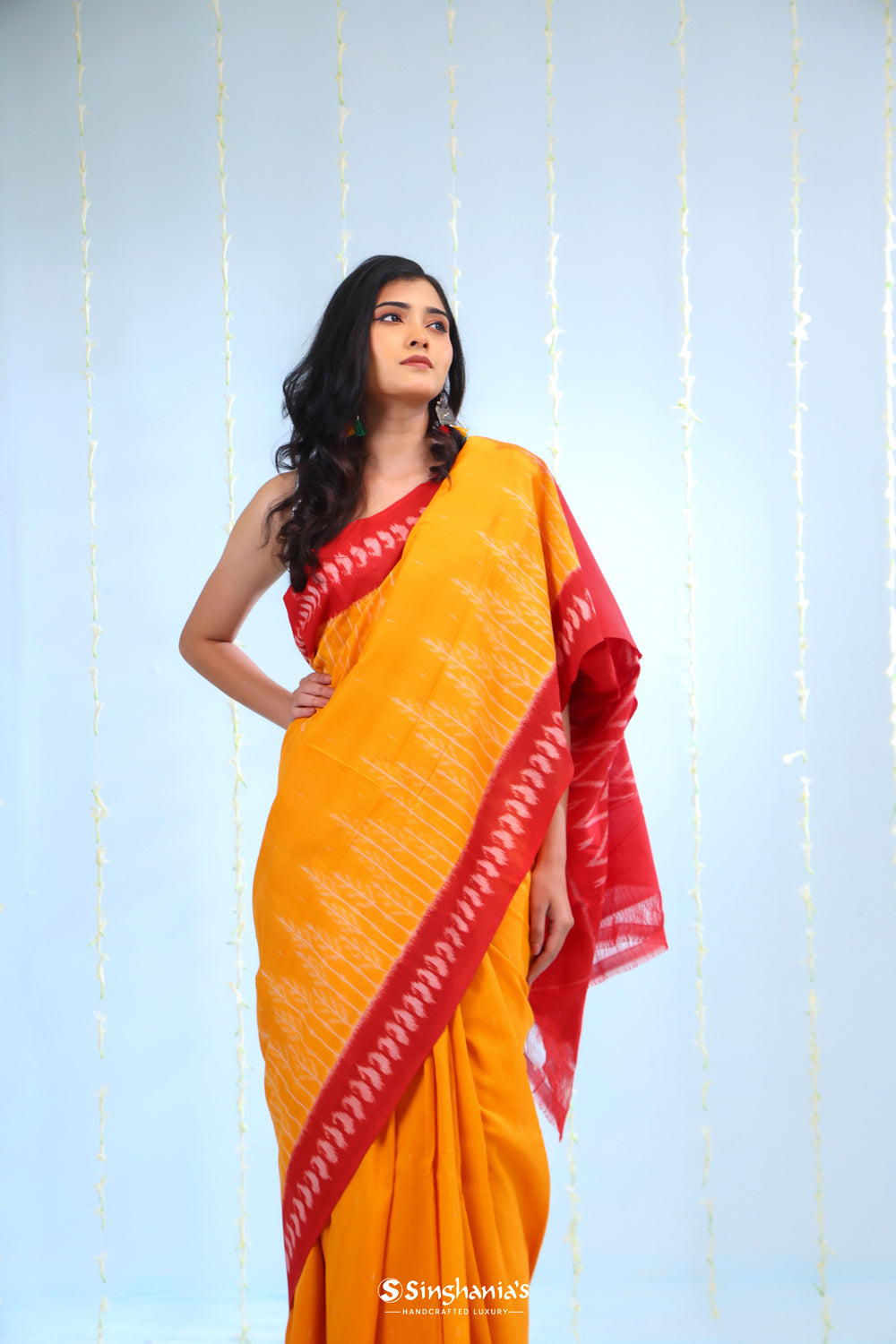 Marigold Orange Ikkat Cotton Saree With Contrast Border