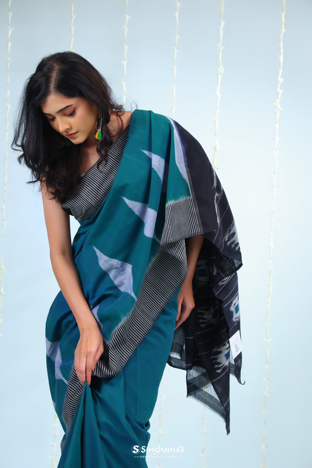 Peacock Blue Ikkat Cotton Saree With Contrast Border