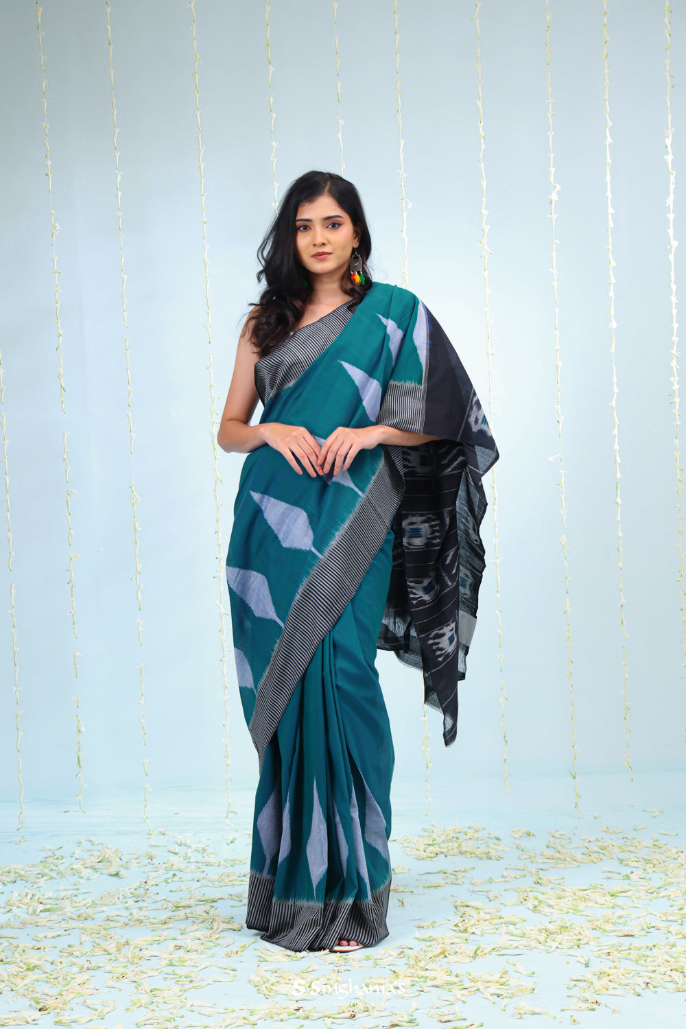 Peacock Blue Ikkat Cotton Saree With Contrast Border