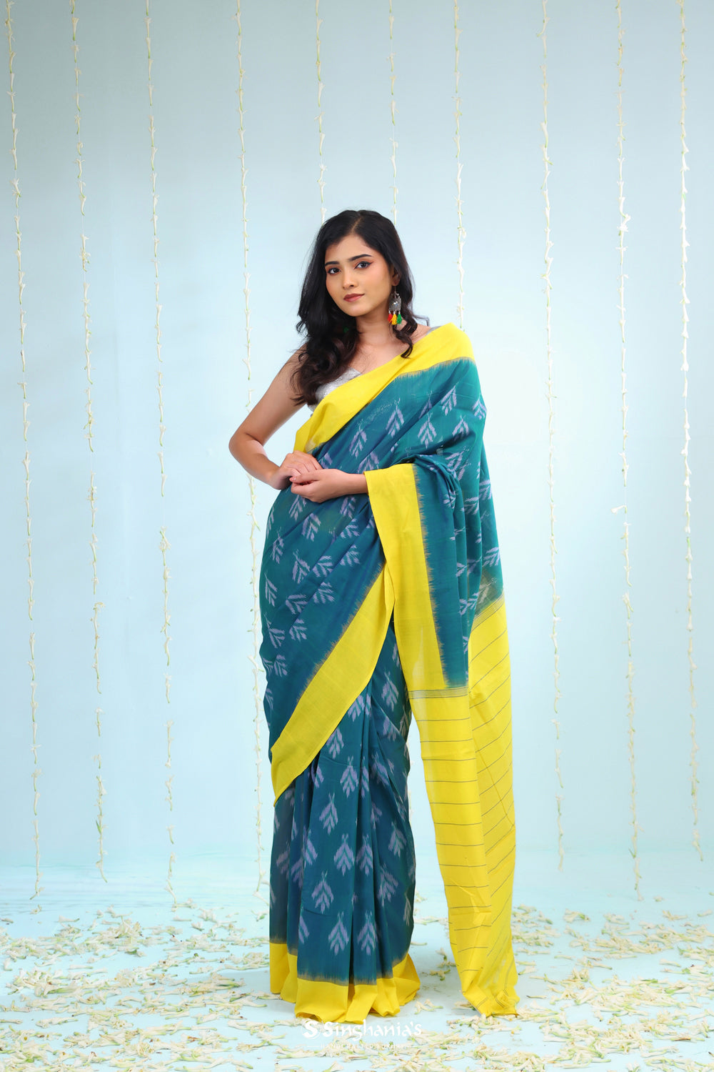 Peacock Green Ikkat Cotton Saree With Contrast Border