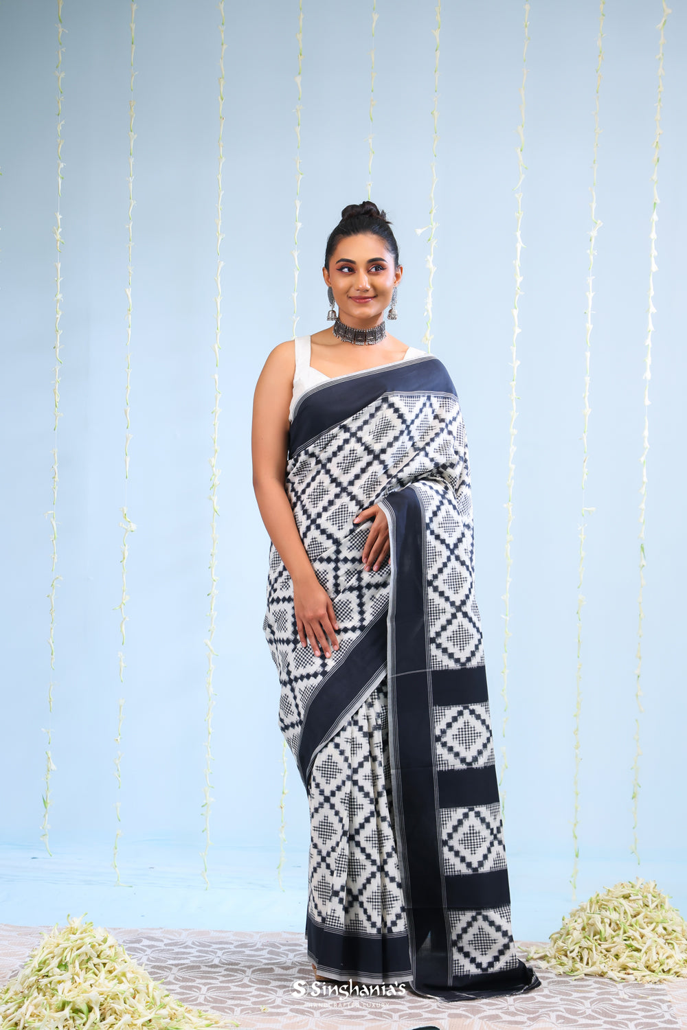 Merino White Ikkat Cotton Saree With Black Pattern