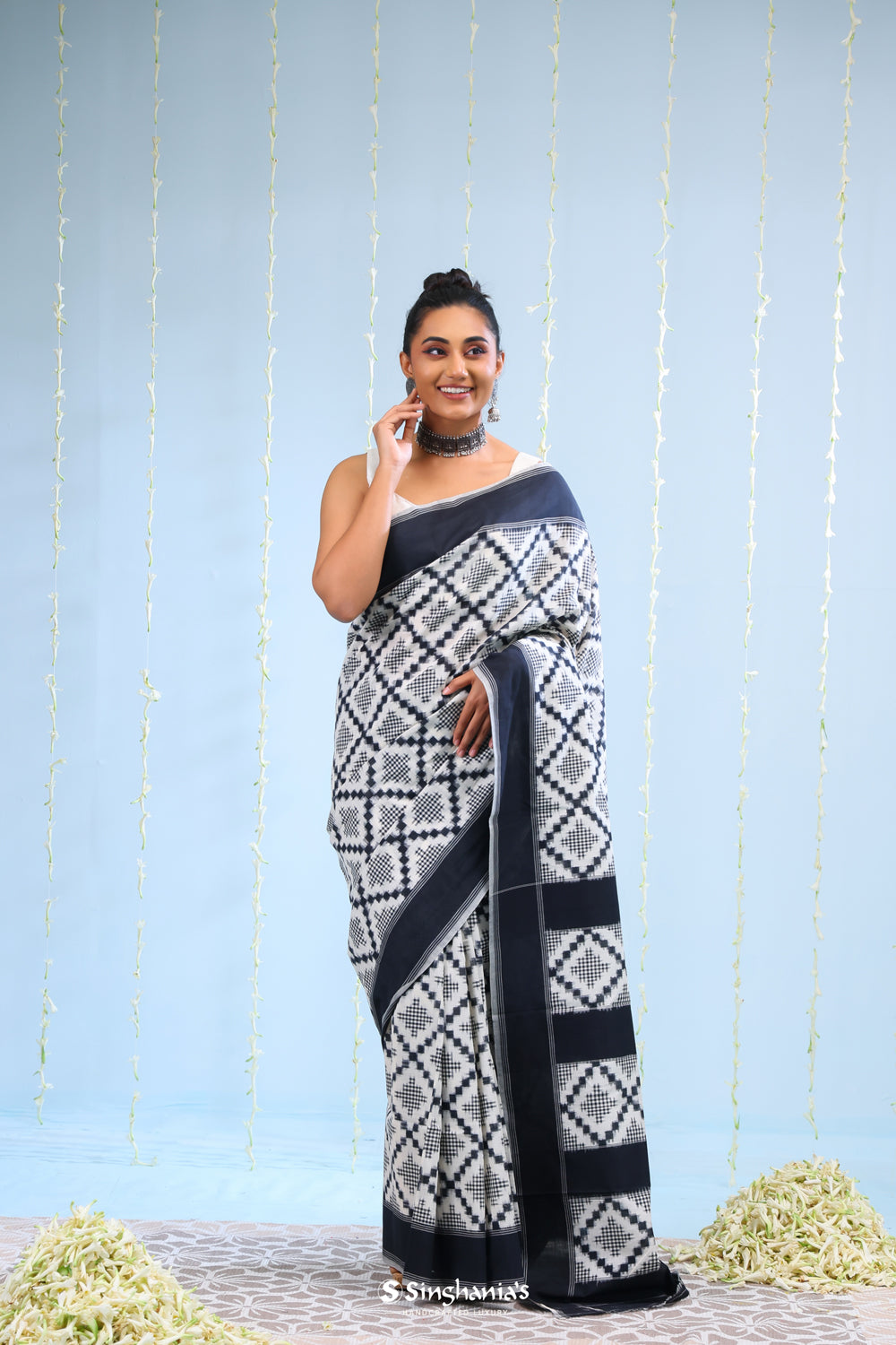 Merino White Ikkat Cotton Saree With Black Pattern