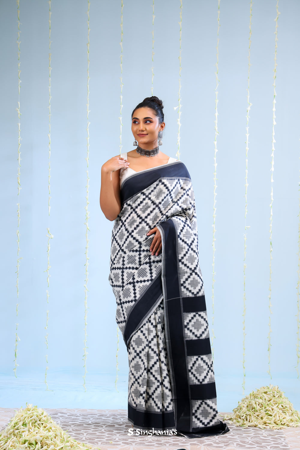 Merino White Ikkat Cotton Saree With Black Pattern