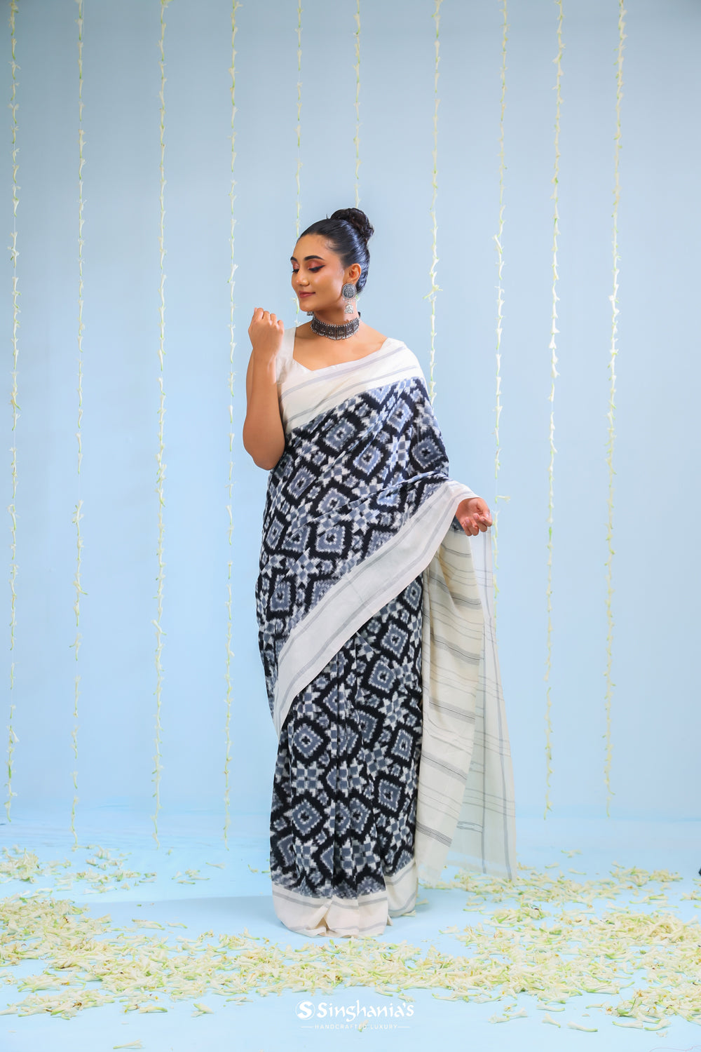 Coal Black Ikkat Cotton Saree With Contrast Border