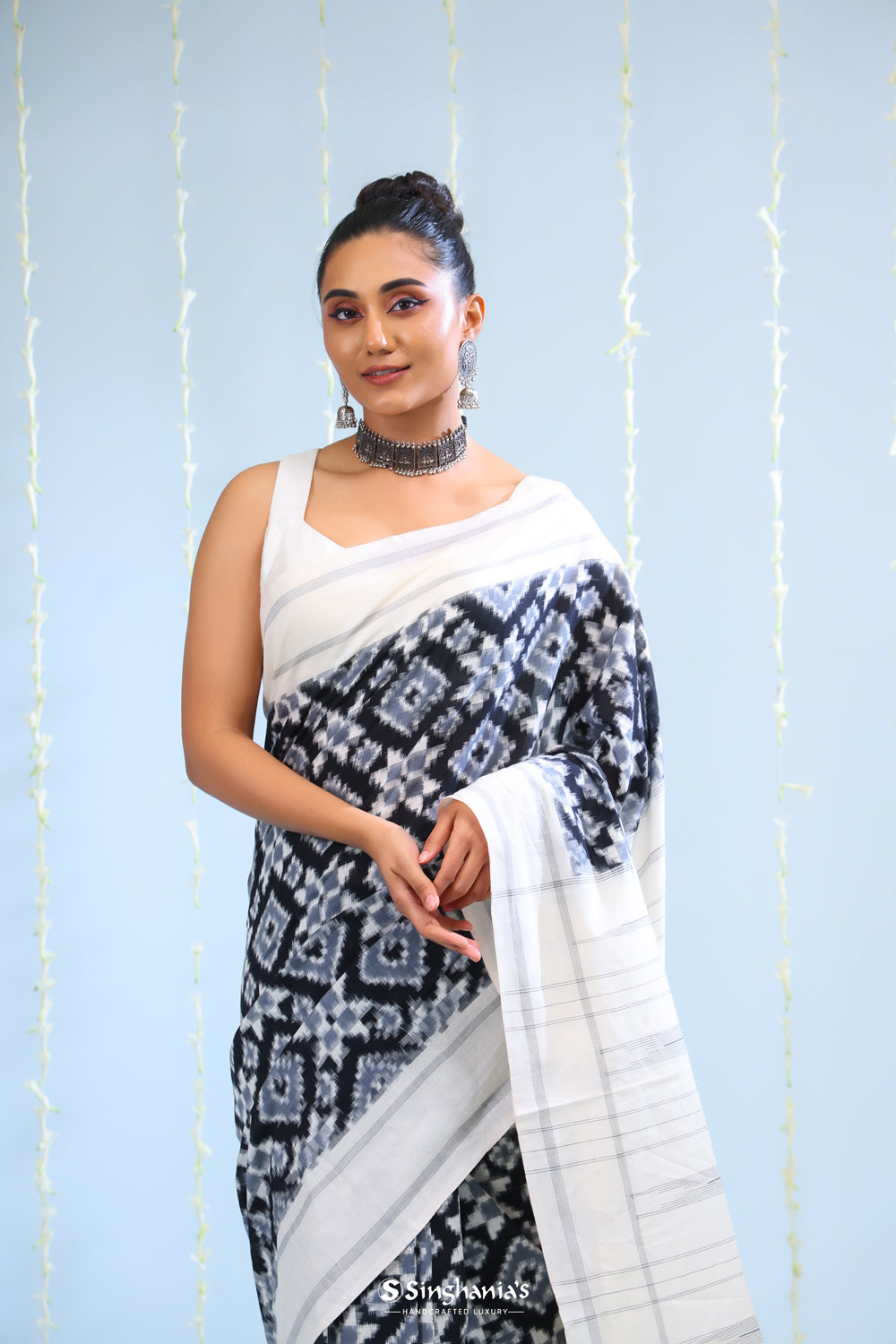 Coal Black Ikkat Cotton Saree With Contrast Border