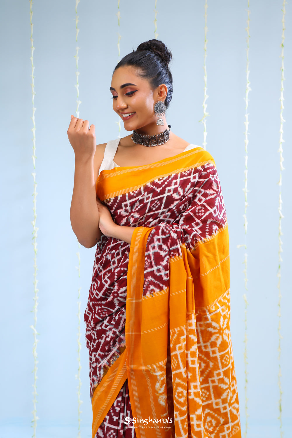 Marigold Orange Ikkat Cotton Saree With Traditional Design