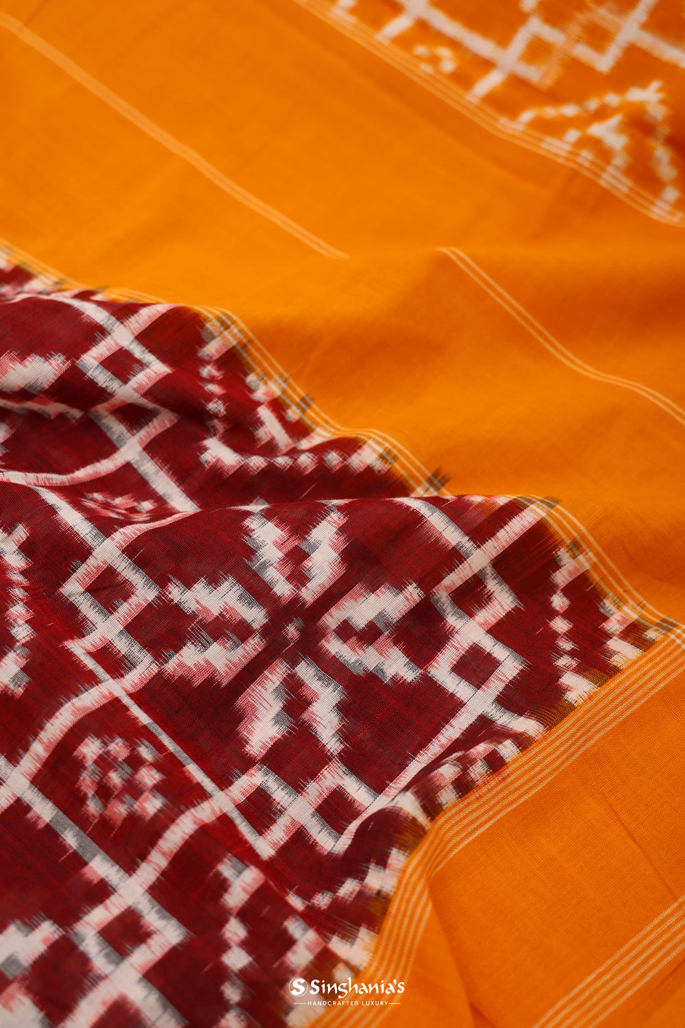 Marigold Orange Ikkat Cotton Saree With Traditional Design