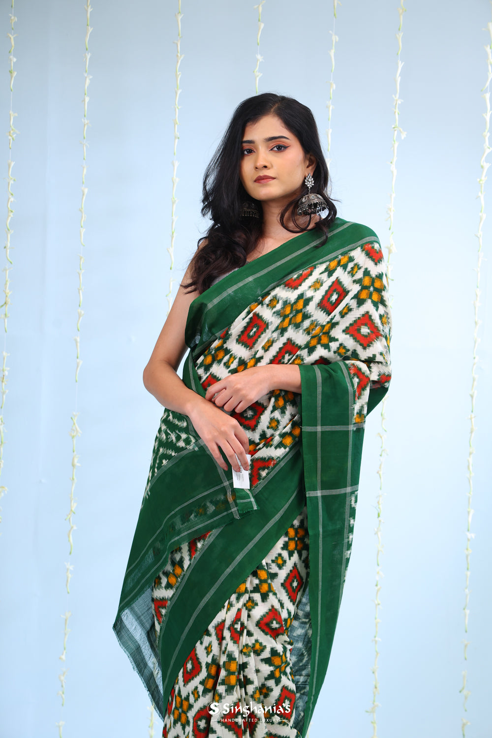 Ivory White Ikkat Cotton Saree With Green Border