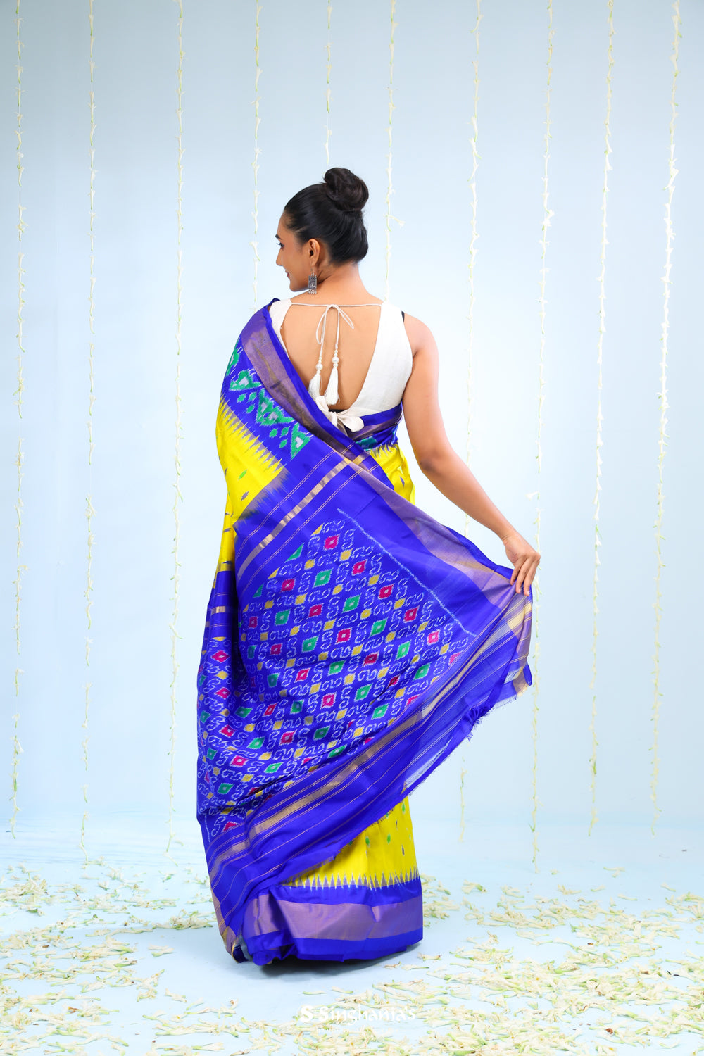 Bright Yellow Ikkat Patola Silk Saree With Contrast Border