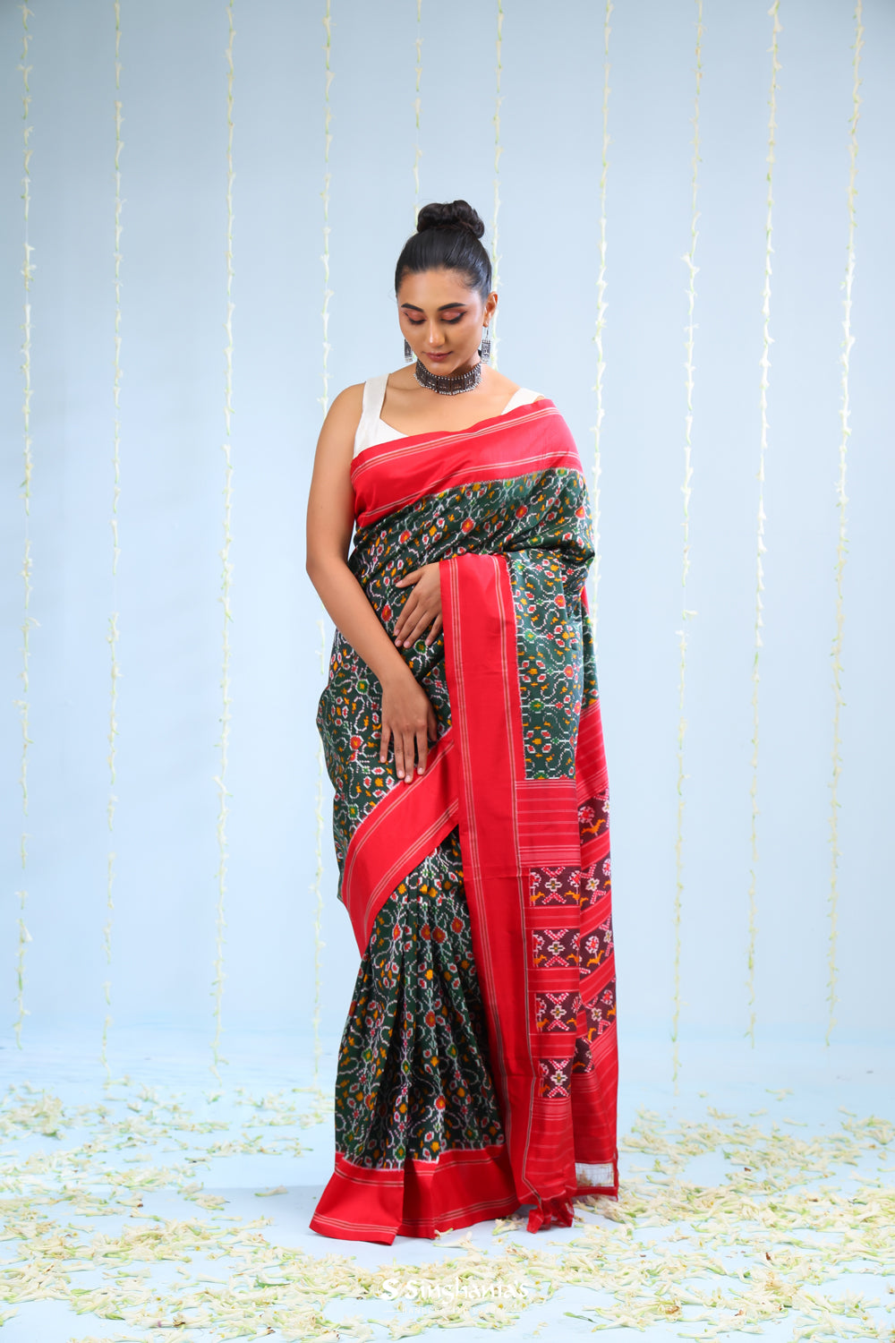 Kaitoke Green Ikkat Silk Saree With Contrast Border