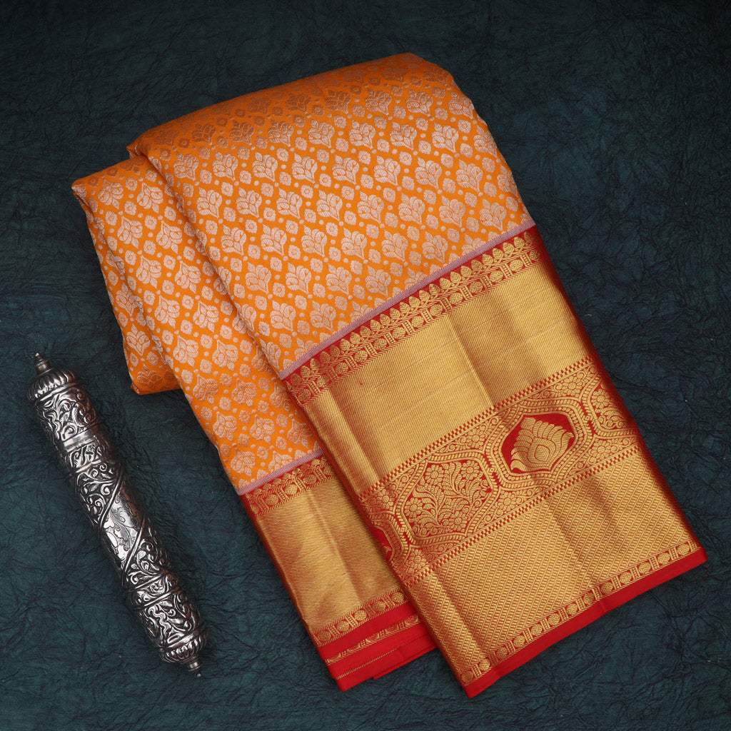 Vibrant Mango Orange Kanjivaram Silk Saree With Floral Buttis - Singhania's