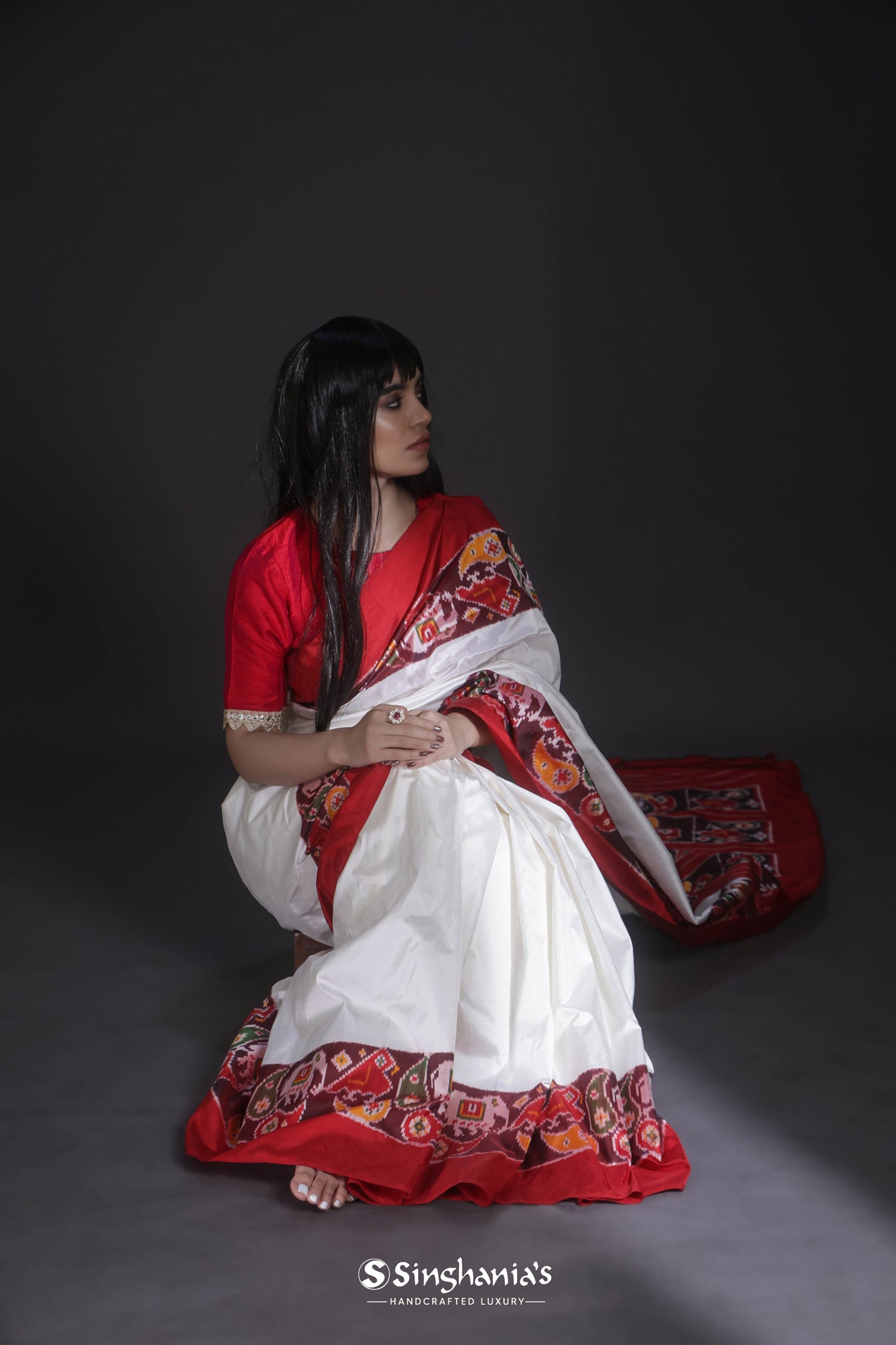 White Patan Patola Silk Saree With Contrast Border