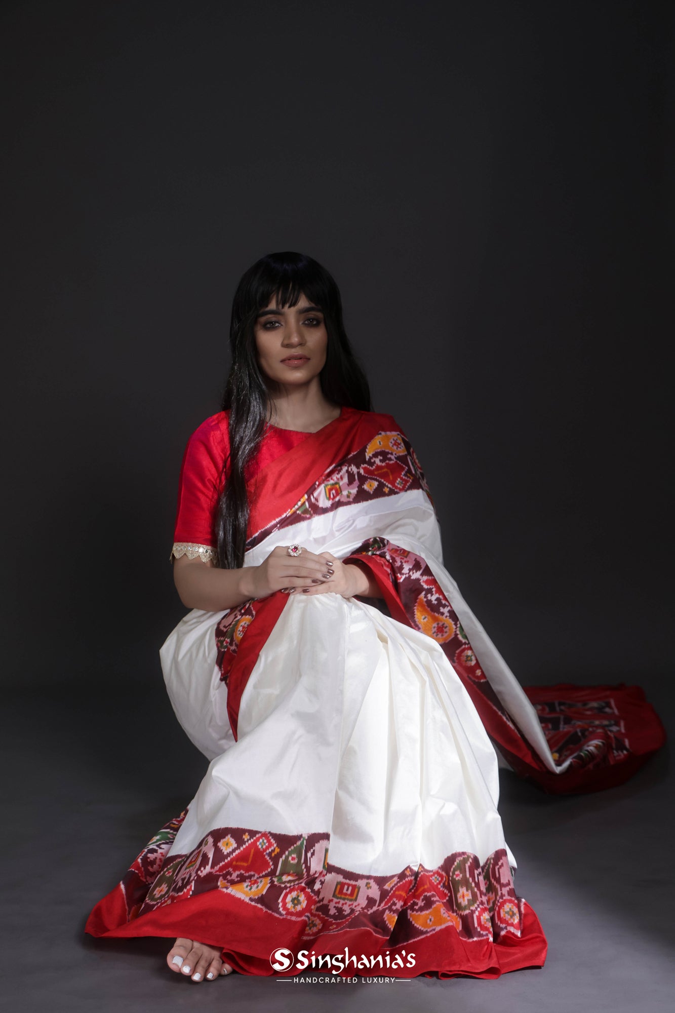 White Patan Patola Silk Saree With Contrast Border