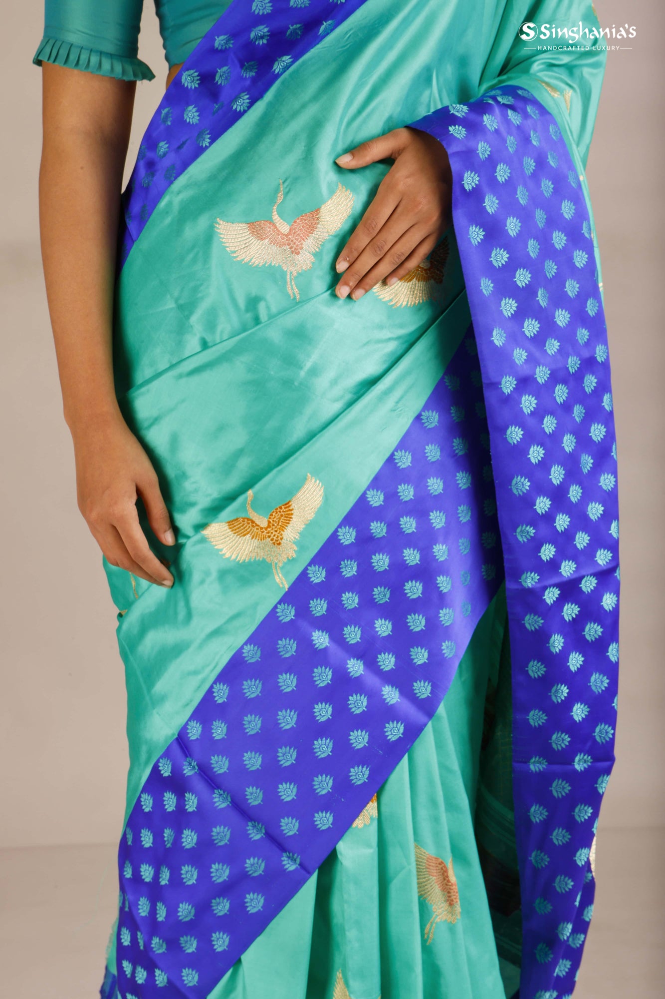 Turquoise Blue Banarasi Silk Saree With Bird Motifs