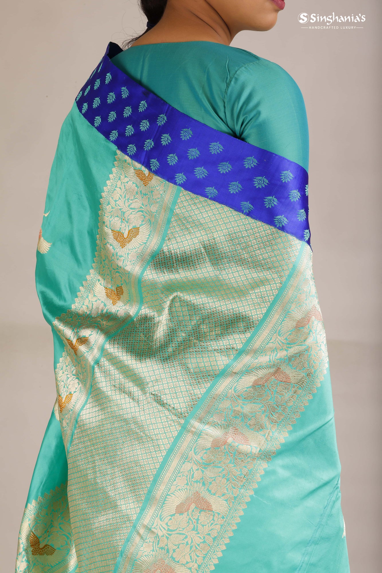 Turquoise Blue Banarasi Silk Saree With Bird Motifs