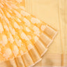 Light Orange Soft Net Saree With Floral Motifs