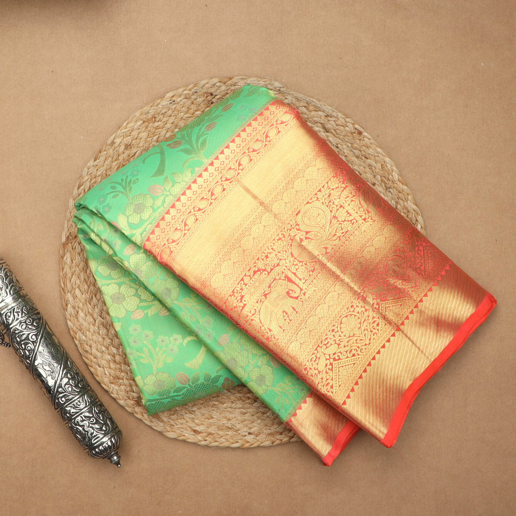 Light Green Kanjivaram Silk Saree With Floral Pattern