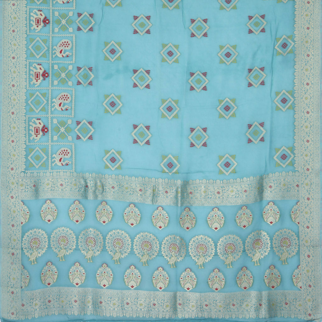 Turquoise Blue Georgette Saree With Floral And Animal Motif Pattern