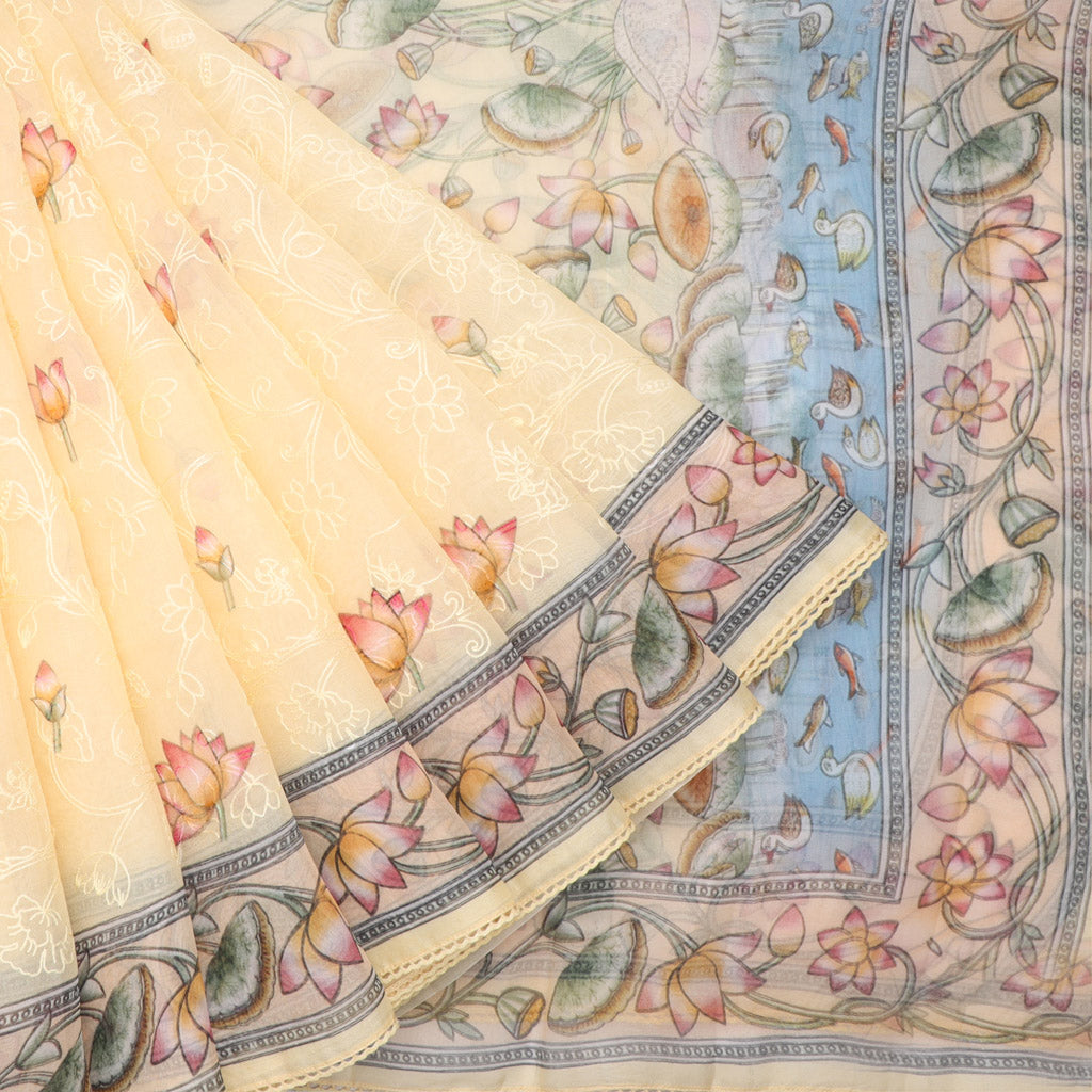 Cream Color Organza Saree With Floral Motifs