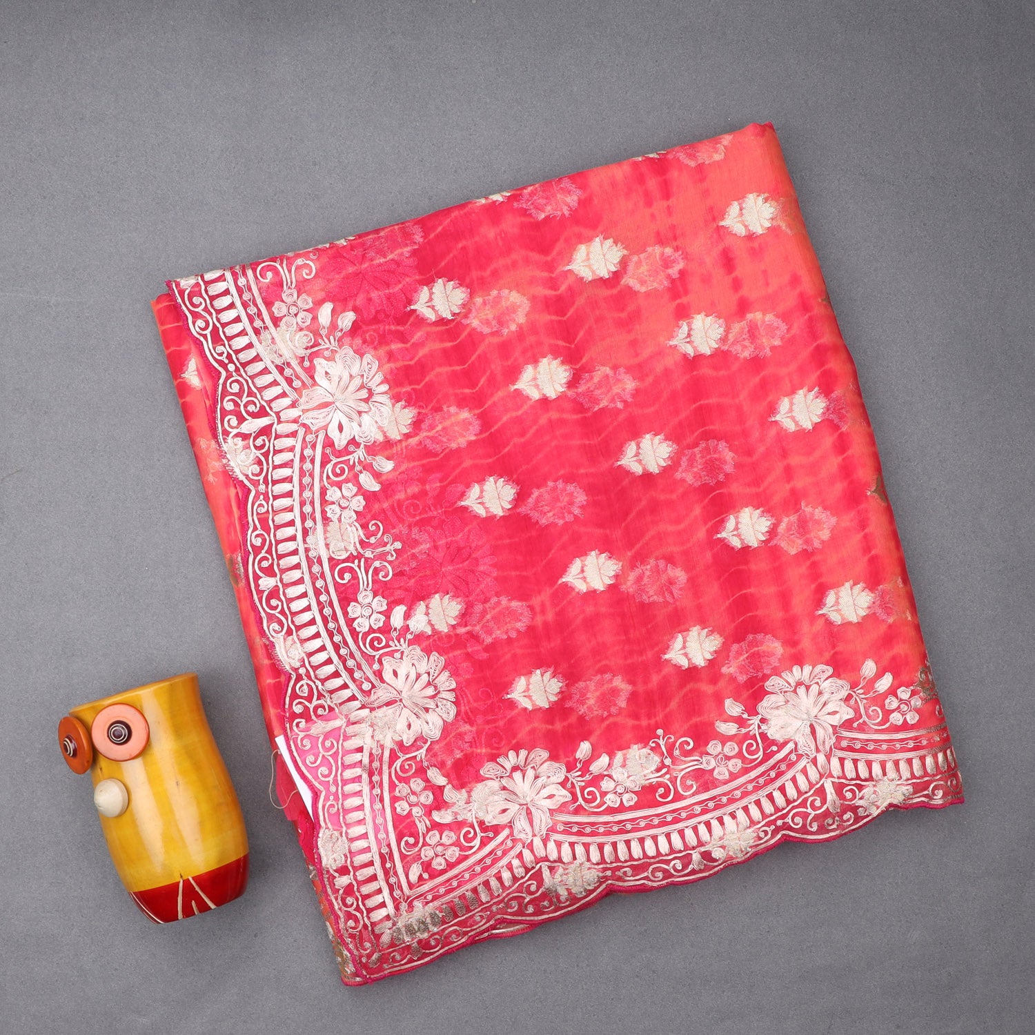 Pinkish Orange Printed Organza Saree With Floral Embroidery