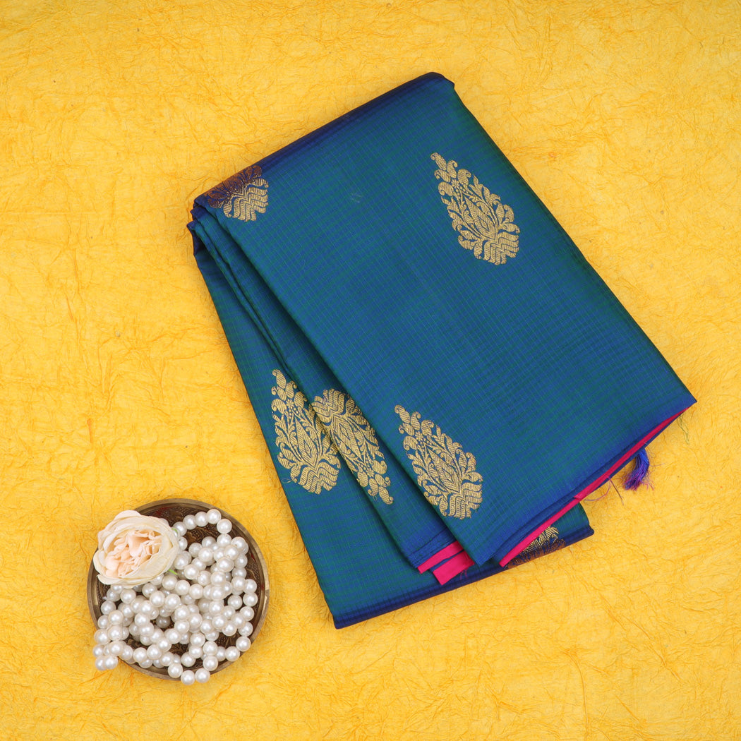 Teal Kanjivaram Silk Saree With Floral Motifs