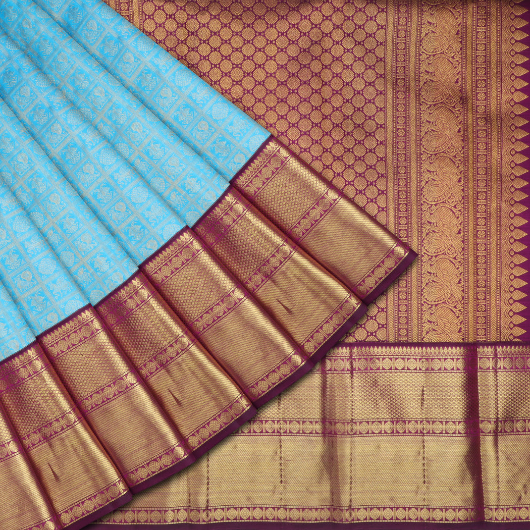Bright Blue Kanjivaram Silk Saree With Floral And Mayil Motifs