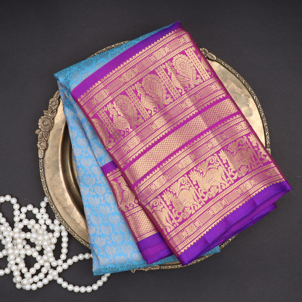 Blue Kanjivaram Silk Saree With Floral Buttis