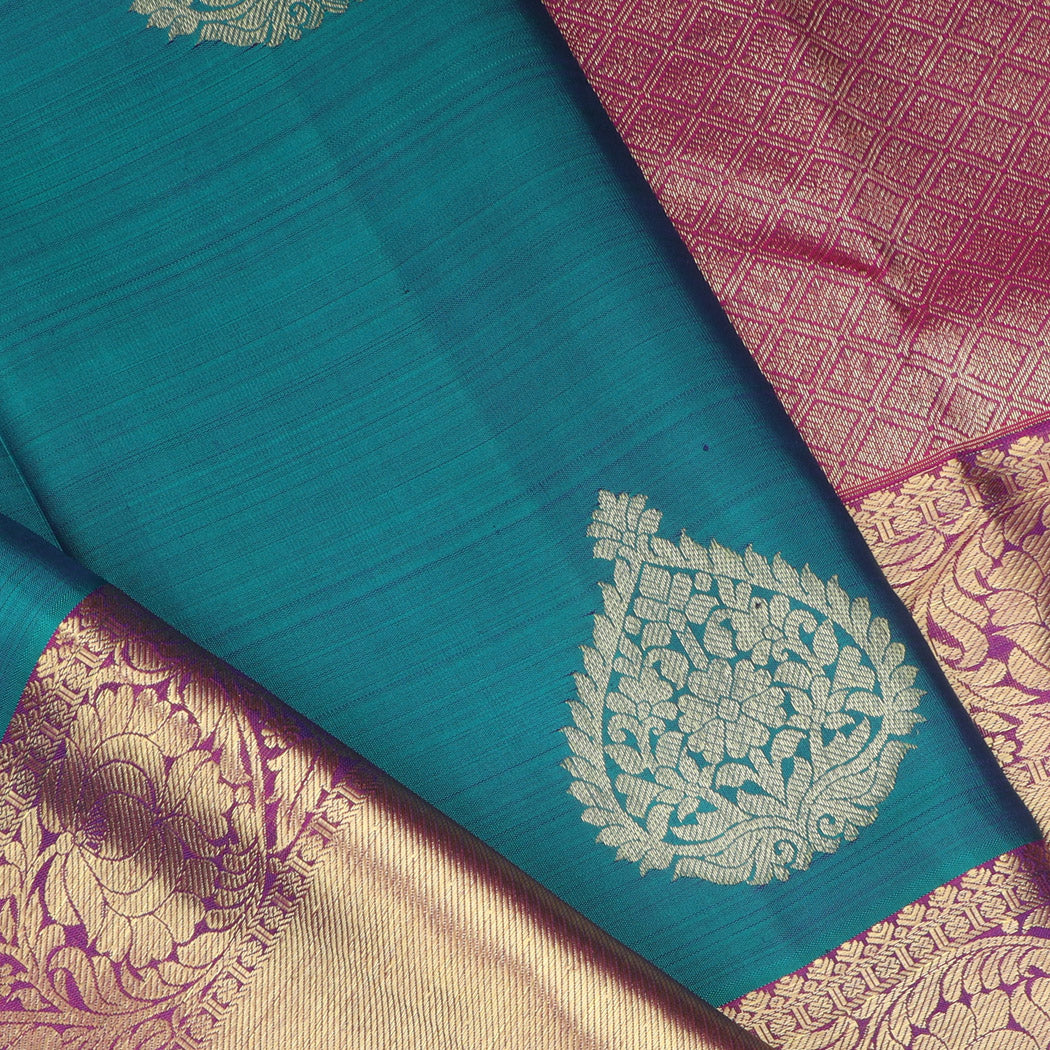 Teal Blue Kanjivaram Silk Saree With Floral Buttas
