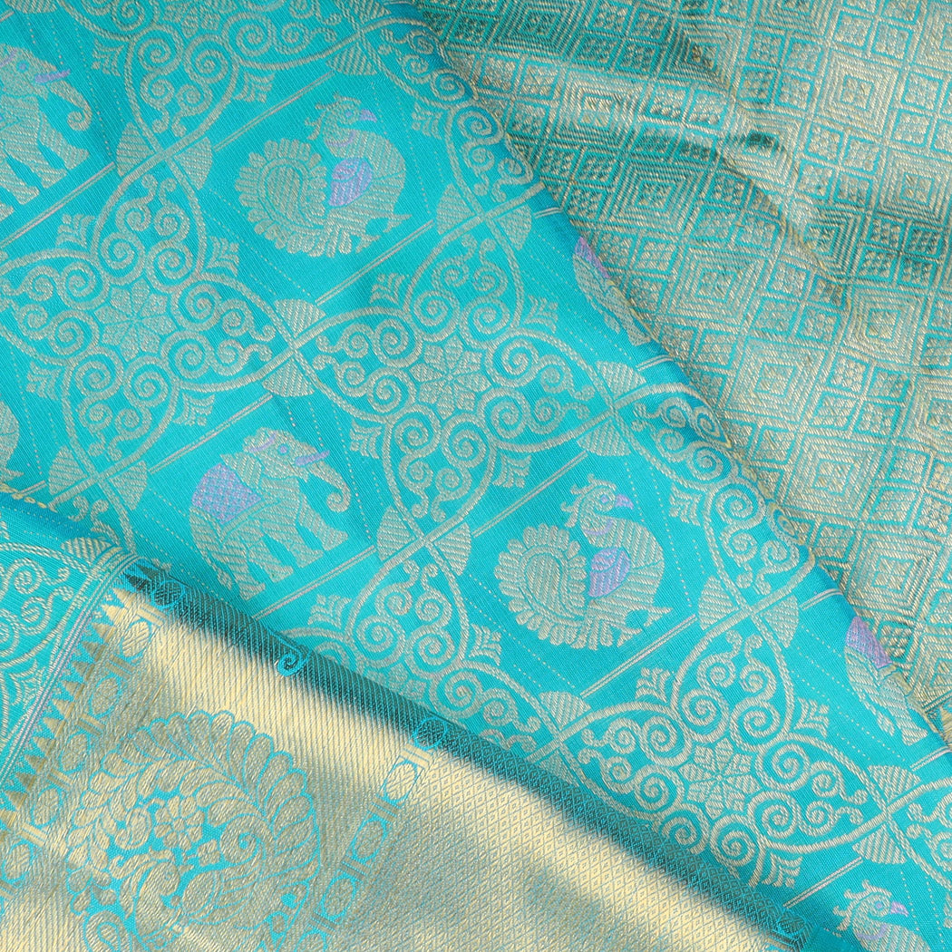 Bright Blue Kanjivaram Silk Saree With Floral Mayil Jaal Design