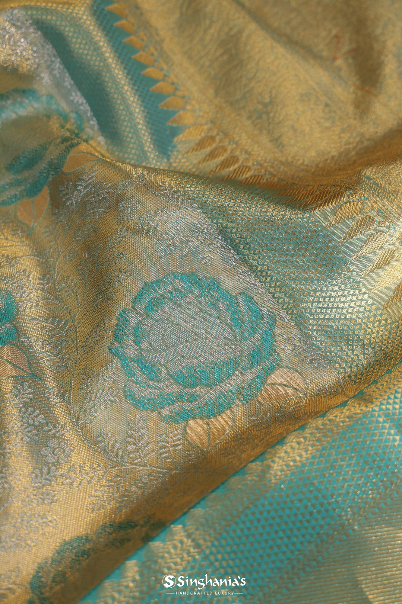 Medium Turquoise Blue Tissue Kanjivaram Silk Saree With Floral Design