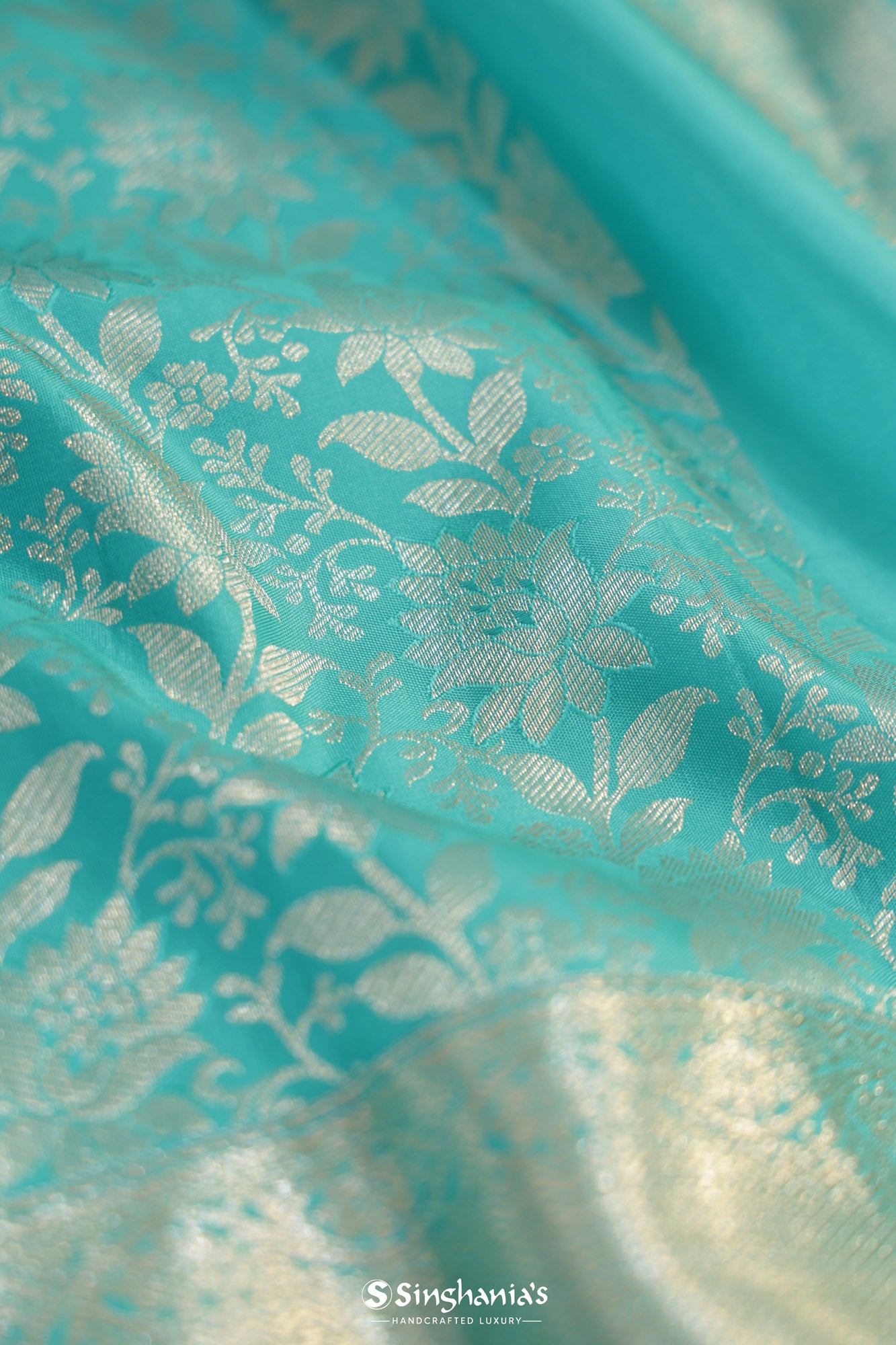 Turquoise Blue Kanjivaram Silk Saree With Floral Design