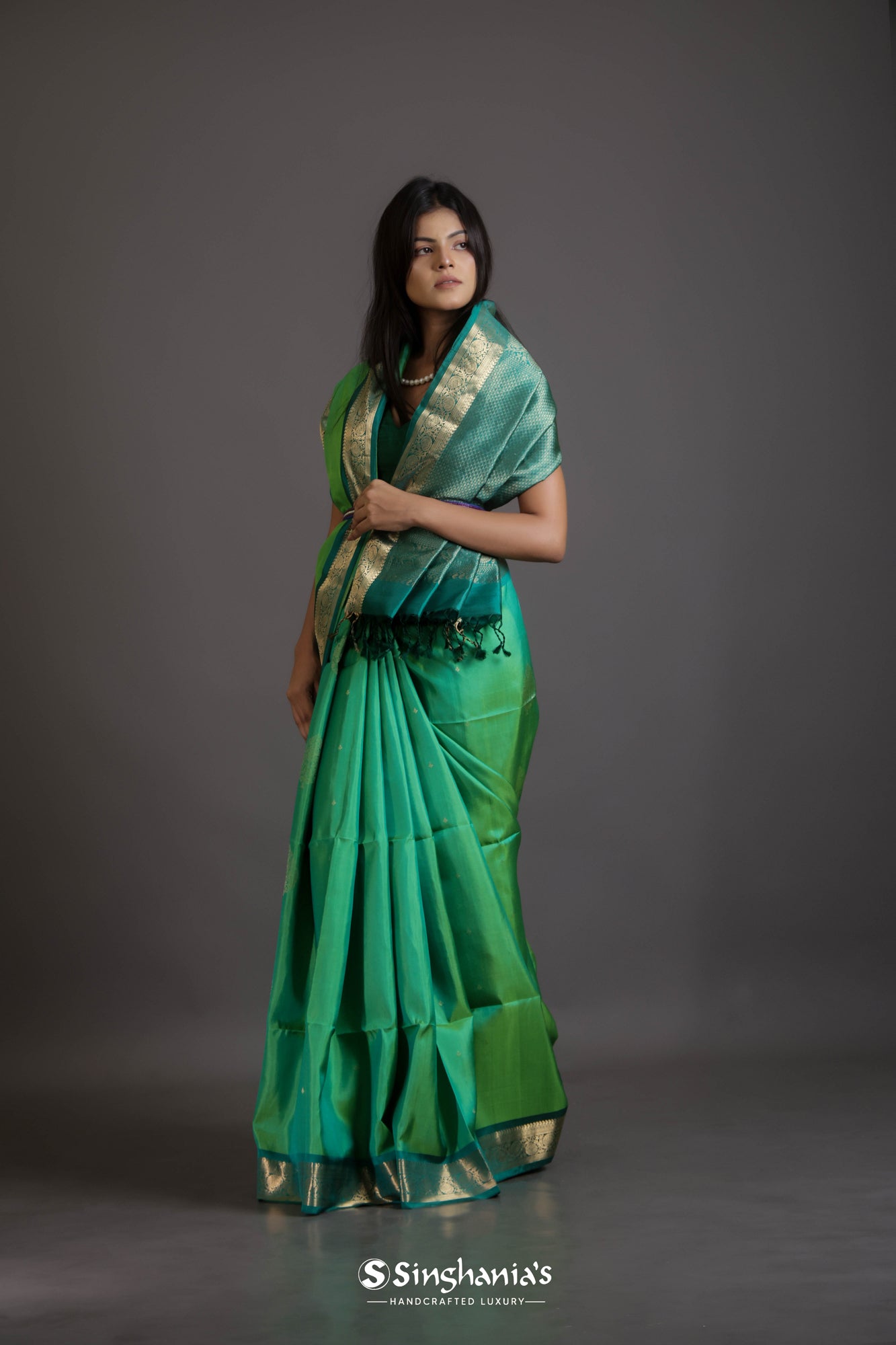 Jungle Green Soft Silk Saree With Floral Buttas Weaving