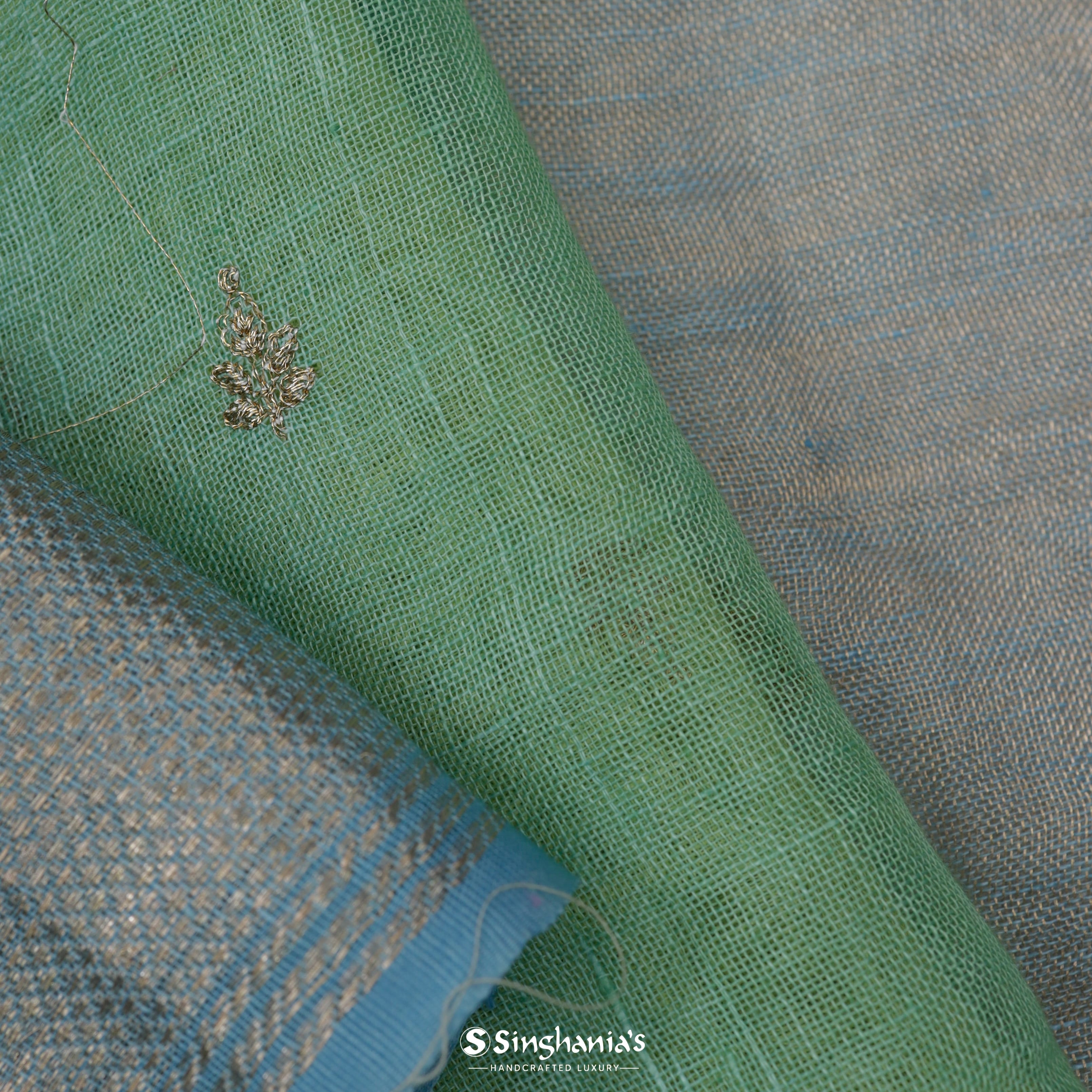 Dual Shade Blue And Green Linen Embroidery Saree With Tiny Floral Buttis