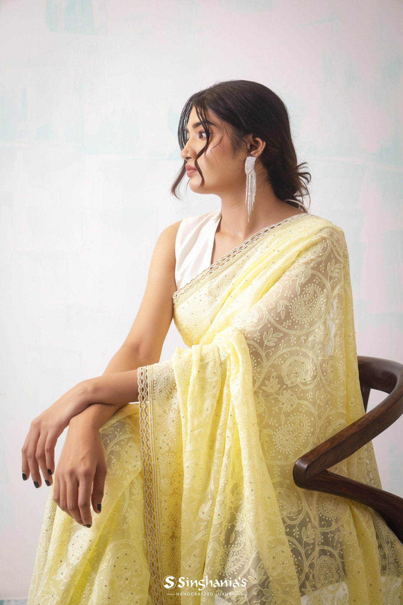 Paste Lemon Yellow Georgette Saree With Hand Embroidery