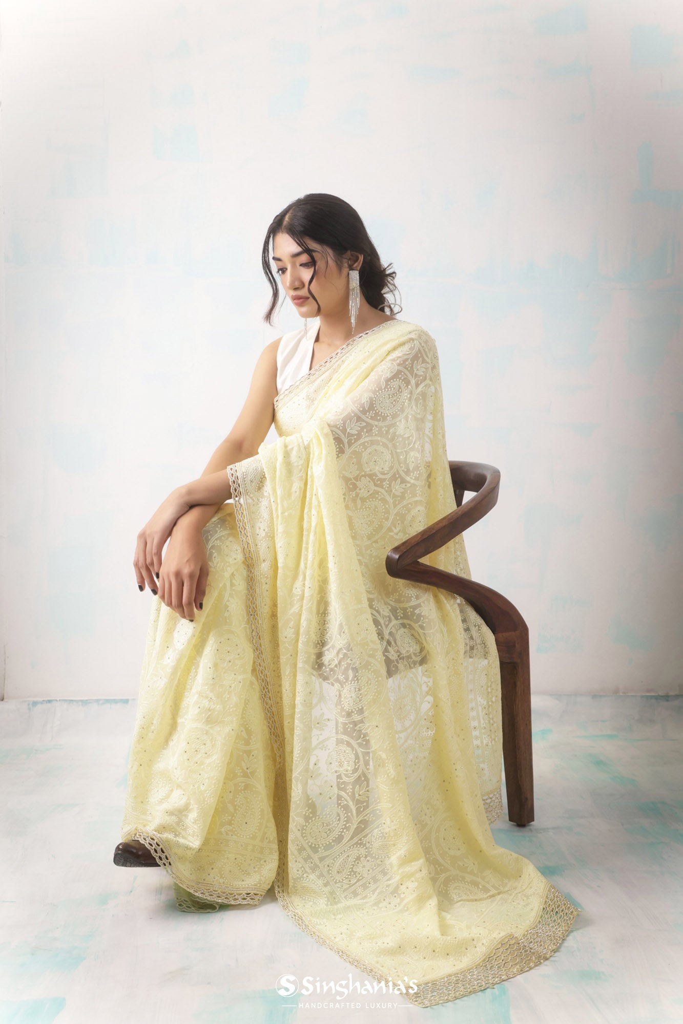 Paste Lemon Yellow Georgette Saree With Hand Embroidery