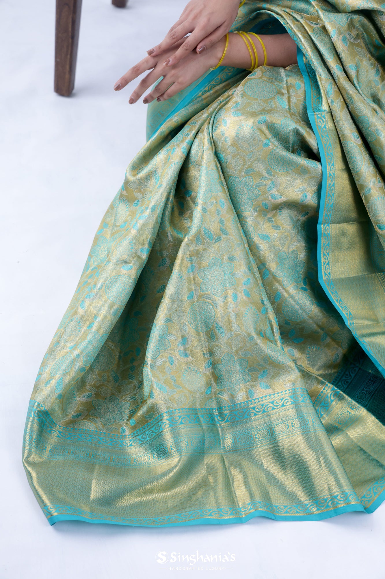 Olive Green Kanjivaram Silk Saree With Floral Design Weaving