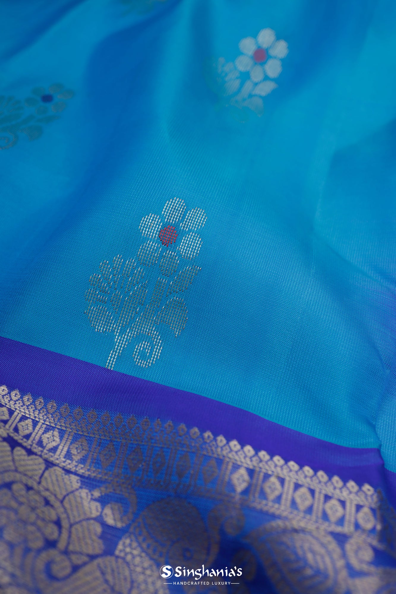 Chlorine Blue Kanjivaram Silk Saree With Floral Buttas Weaving