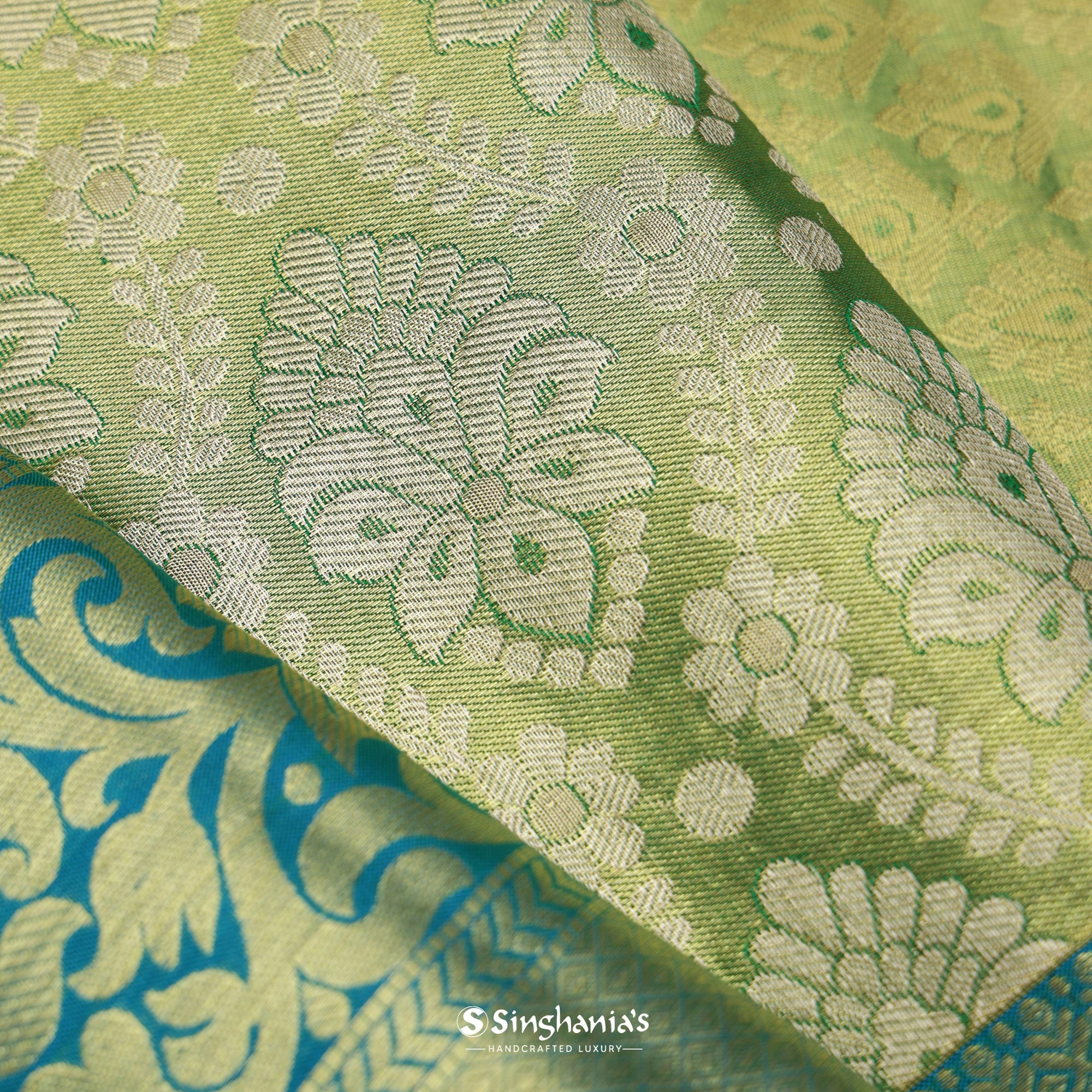 Pastel Olive Green Kanjivaram Silk Saree With Floral Design