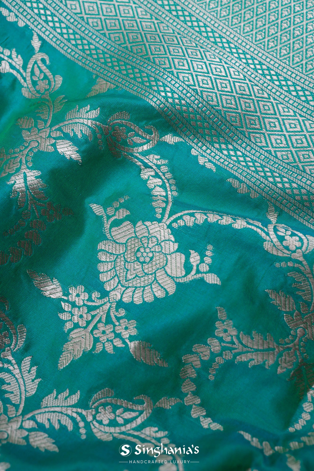 Persian Green Banarasi Silk Saree With Floral Jaal Weaving