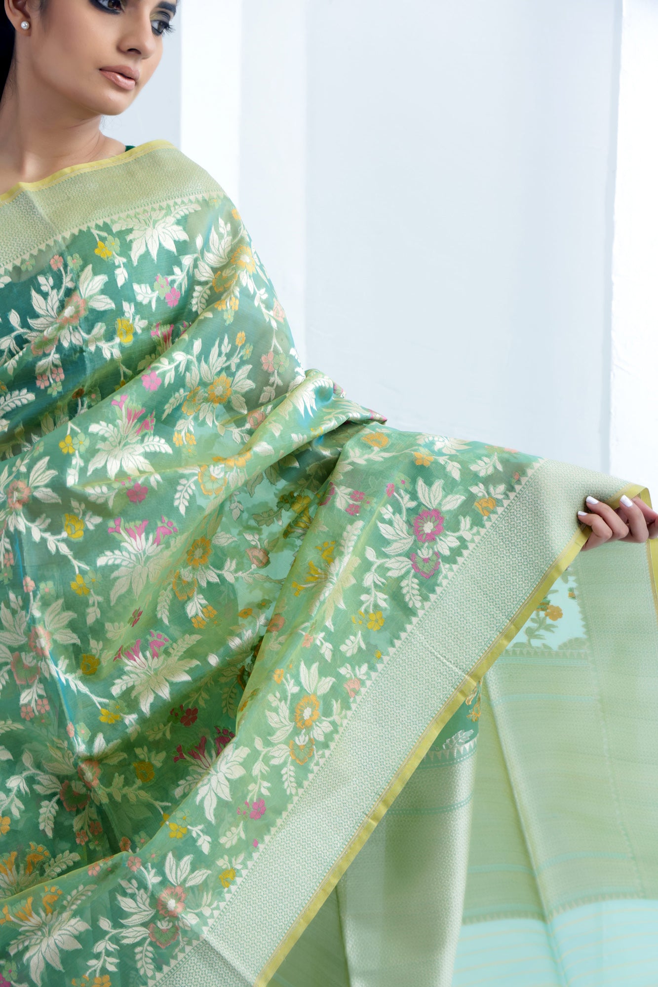Hunter Green Organza Banarasi Saree With Floral Jaal Weaving