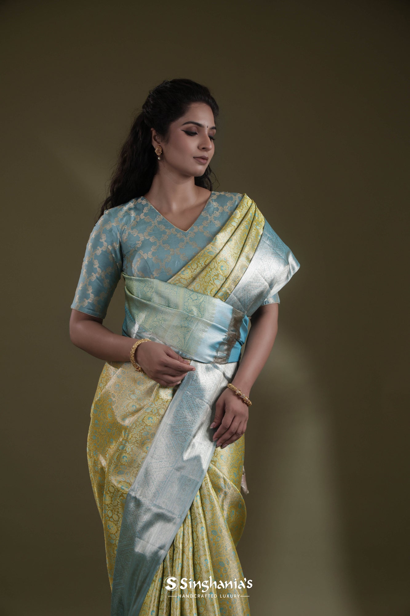Margarita Green Tissue Kanjivaram Saree With Floral Jaal Weaving