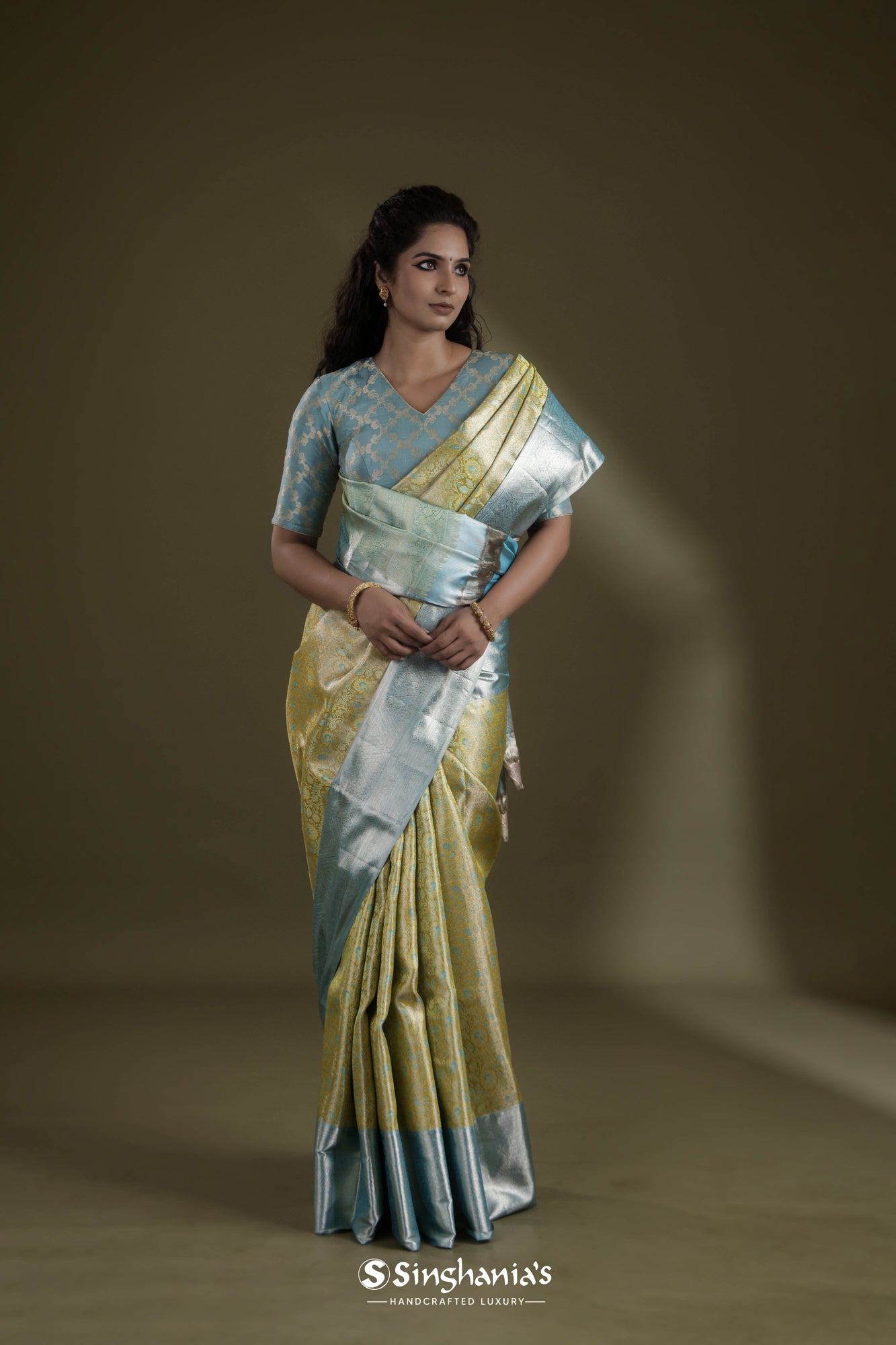 Margarita Green Tissue Kanjivaram Saree With Floral Jaal Weaving