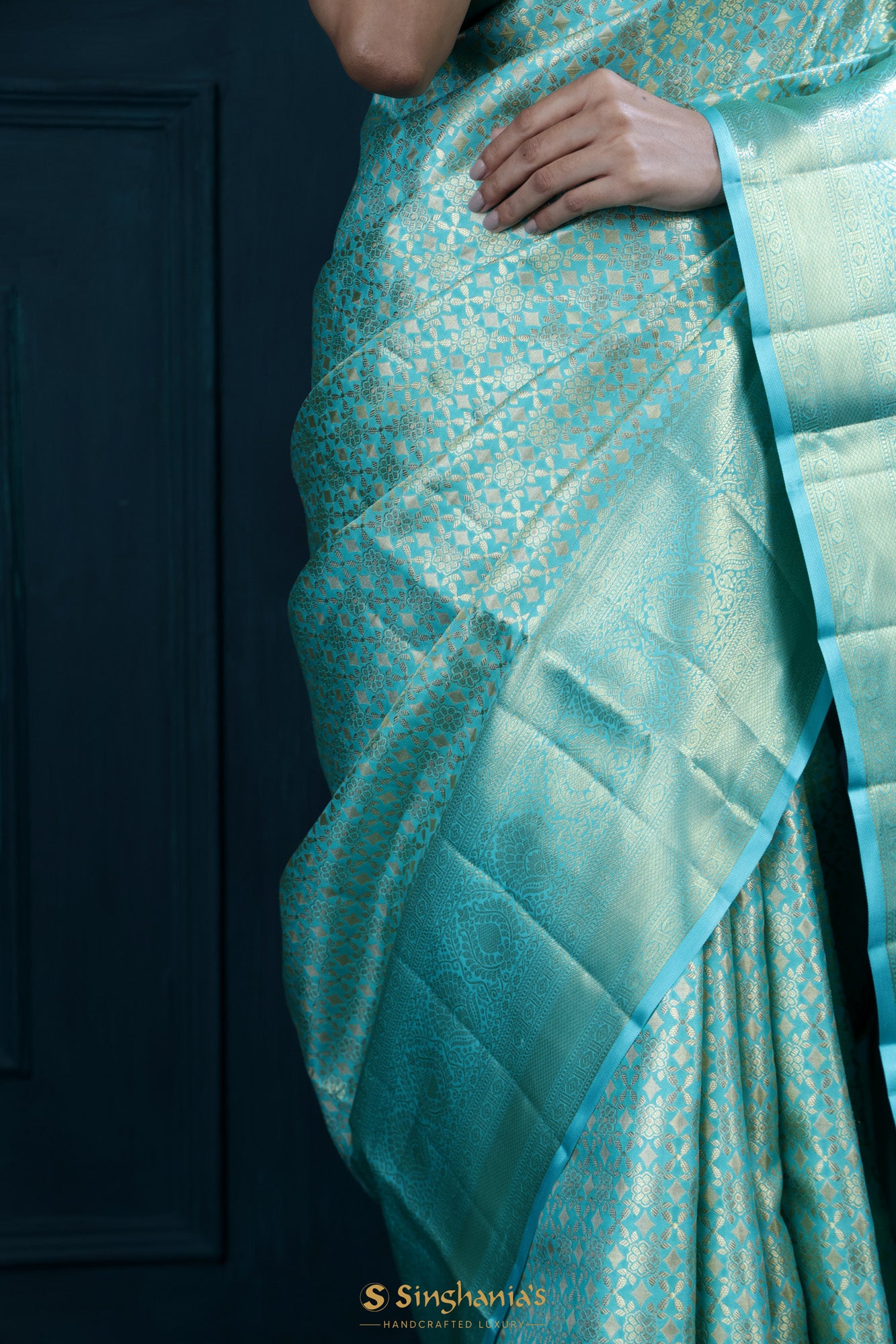 Turquoise Blue Kanjivaram Silk Saree With Floral Jaal Weaving