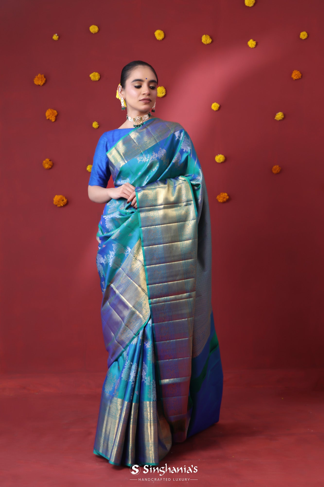 Peacock Blue Tissue Kanjivaram Saree With Floral Weaving